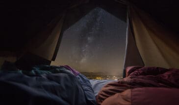 Glamping tent door view milky way and stars