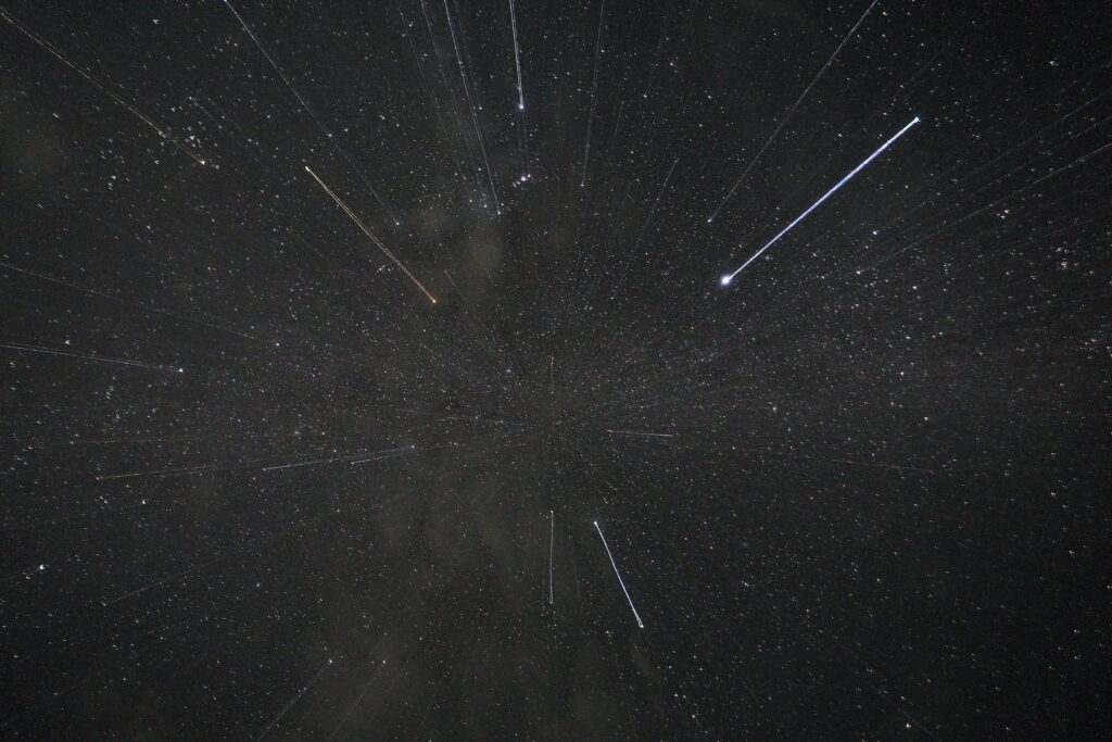 Stars are being seen in the sky during the Geminid meteor showers in Ratnapura, Sri Lanka, on December 14, 2023. The Geminids are a prolific meteor shower caused by the object 3200 Phaethon, which is thought to be a Palladian asteroid with a ''rock comet'' orbit. This makes the Geminids, together with the Quadrantids, the only major meteor showers not originating from a comet. (Photo by Thilina Kaluthotage/NurPhoto) (Photo by Thilina Kaluthotage / NurPhoto / NurPhoto via AFP)